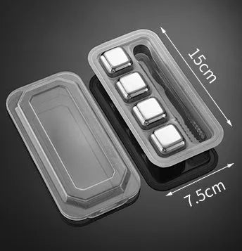 Set of 8 stainless steel ice cubes in square and ball shapes with plastic storage box and tong on a wooden surface