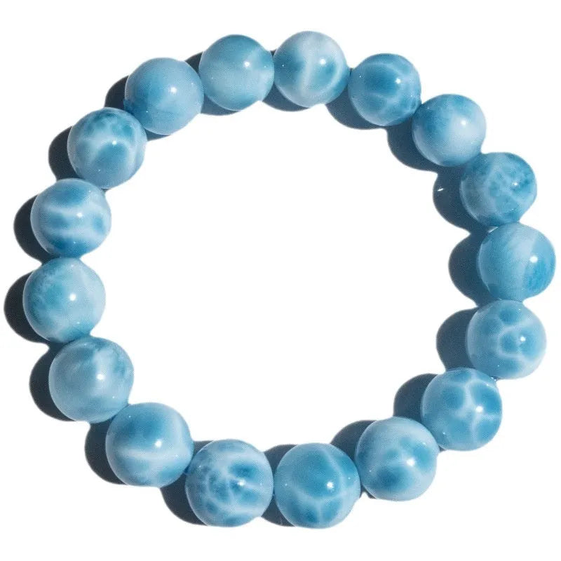 Blue Bodhi bracelet with natural crystal sea-pattern stones and pearl accents in Maillard style design