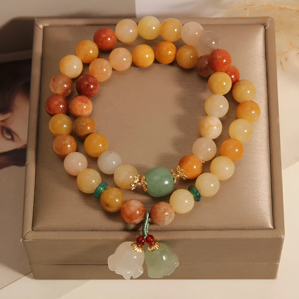 Natural jade multi-layer bracelet for women with orchid pendant on elasticated cord