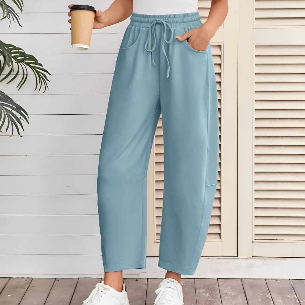 Women's loose cotton cropped sweatpants with drawstring waist and side pockets in multiple colours