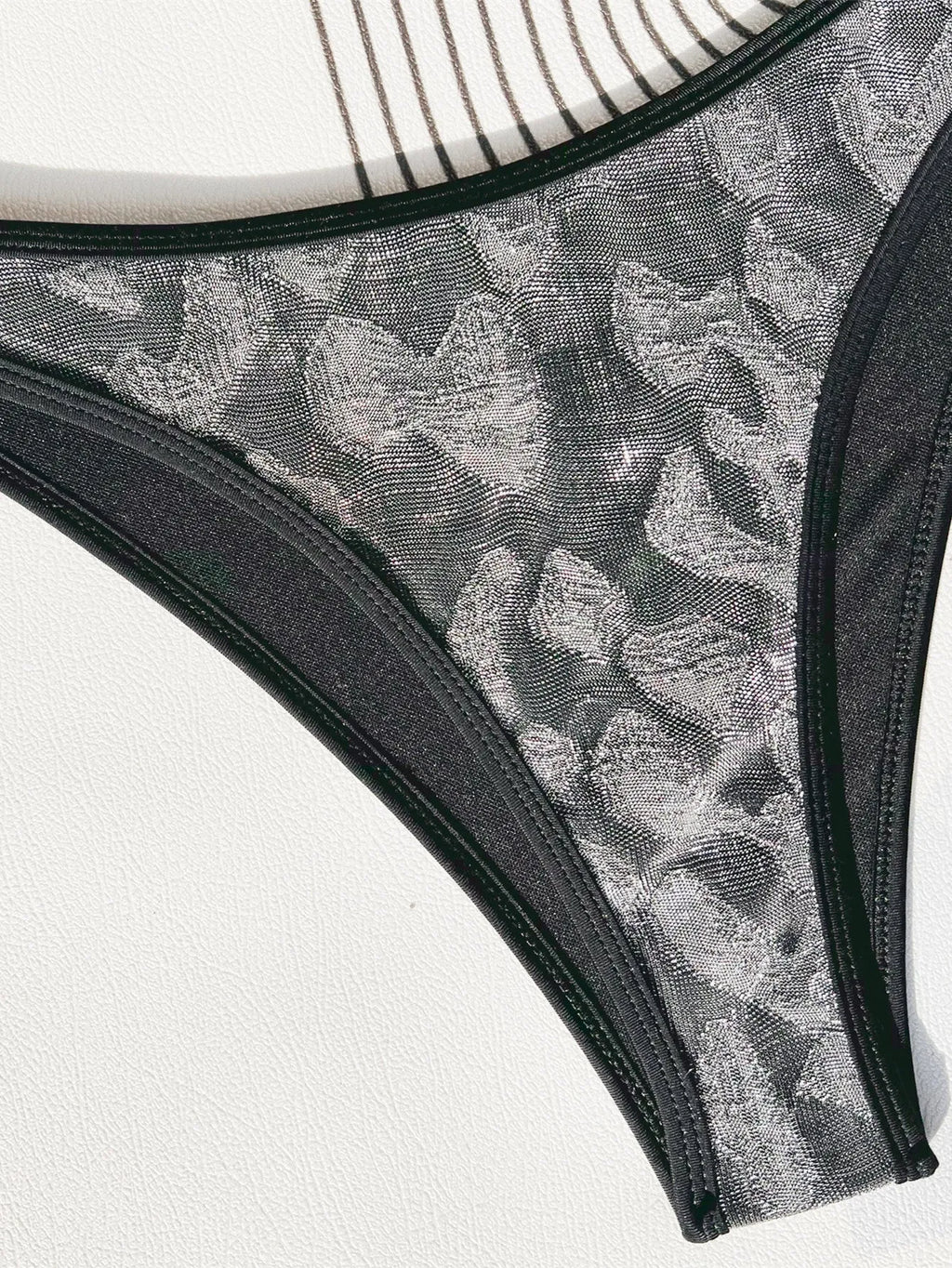 Women's black polyester bikini strap swimsuit two-piece set