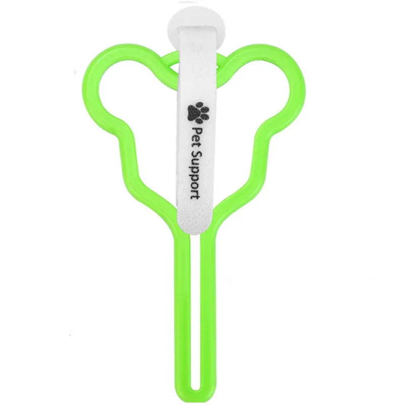 A hands-free dog poop bag holder with a fixed clip and adjustable hook and loop fastener attached to a dog leash.