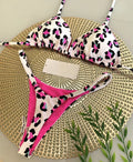 Women's printed bikini swimsuit set with quick-dry fabric on a mannequin, showing briefs style.