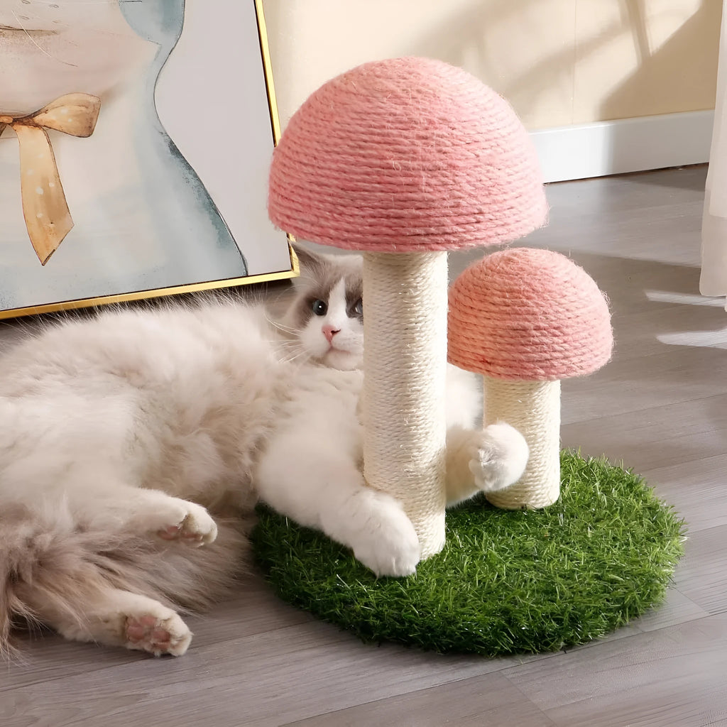 Pink mushroom-shaped cat scratching post with sisal-covered pole for kittens and small cats