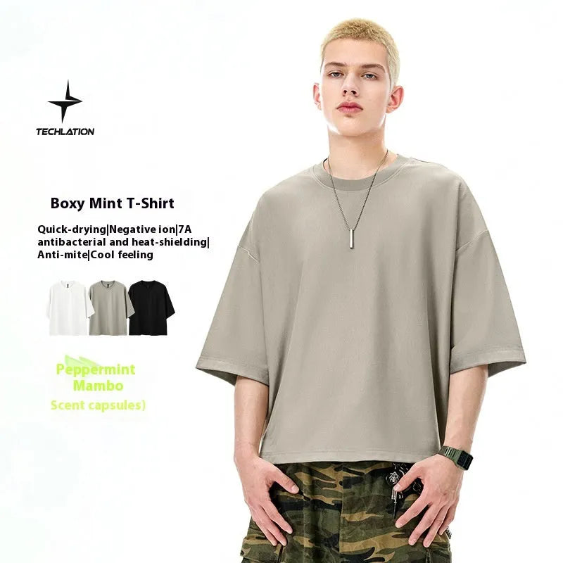 Men's short sleeve casual T-shirt in sand grey or black with loose fit pullover design