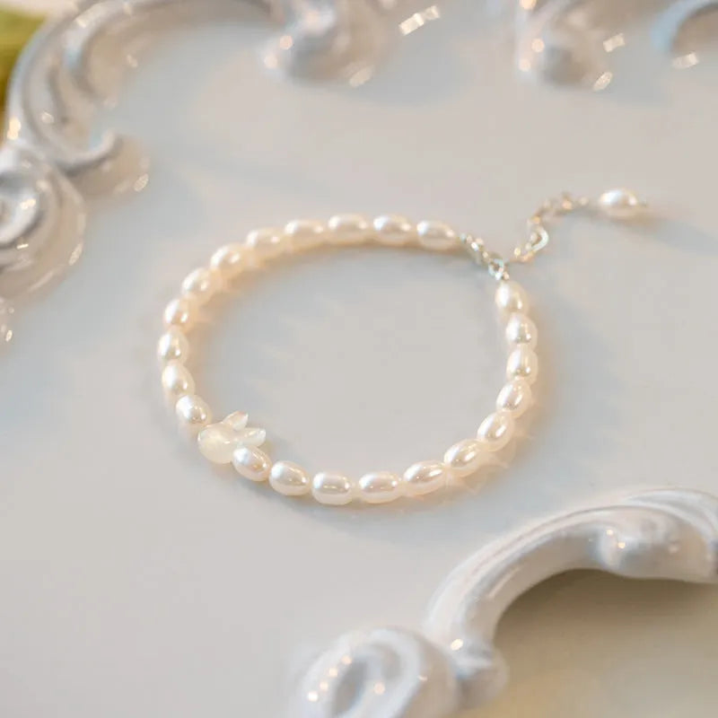 White shell rice-shaped bead pearl elastic rabbit bracelet handmade 925 silver 16cm Korean style women's jewellery