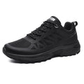 Men's black and orange breathable mesh running shoes with lace-up front and rubber sole