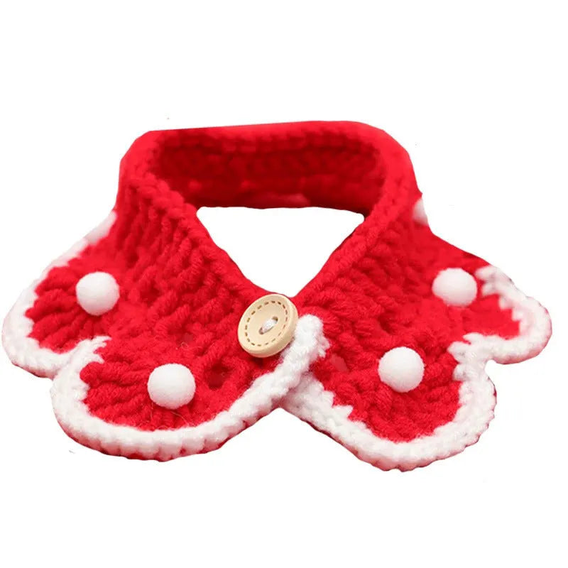 Hand-knitted wool blend collar scarf for a small dog, showing a cartoon pattern and soft texture.