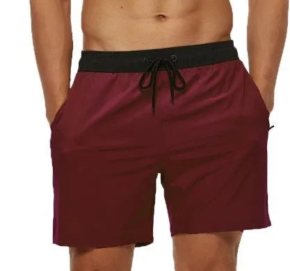 Men's blue stitching waist drawstring athletic shorts with zipper pocket and padding