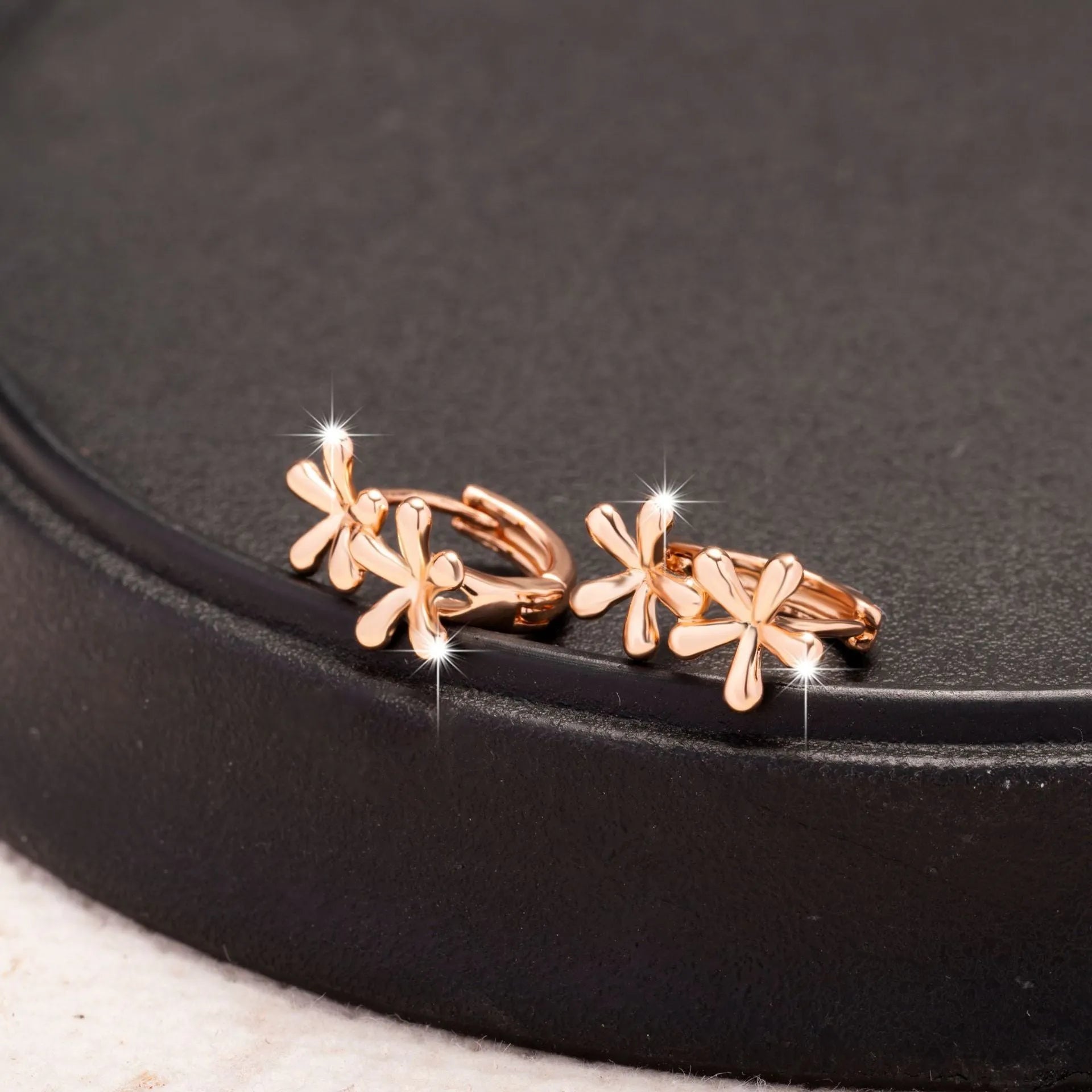 Rose gold circular waterdrop floral earrings for women with electroplated finish