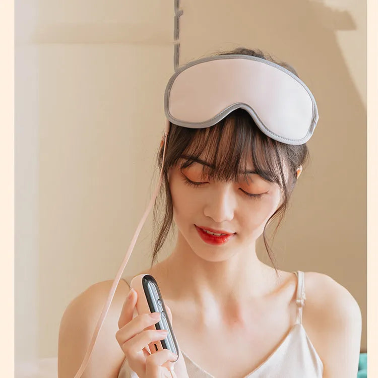 Green portable eye SPA mask with suede exterior on a white background.