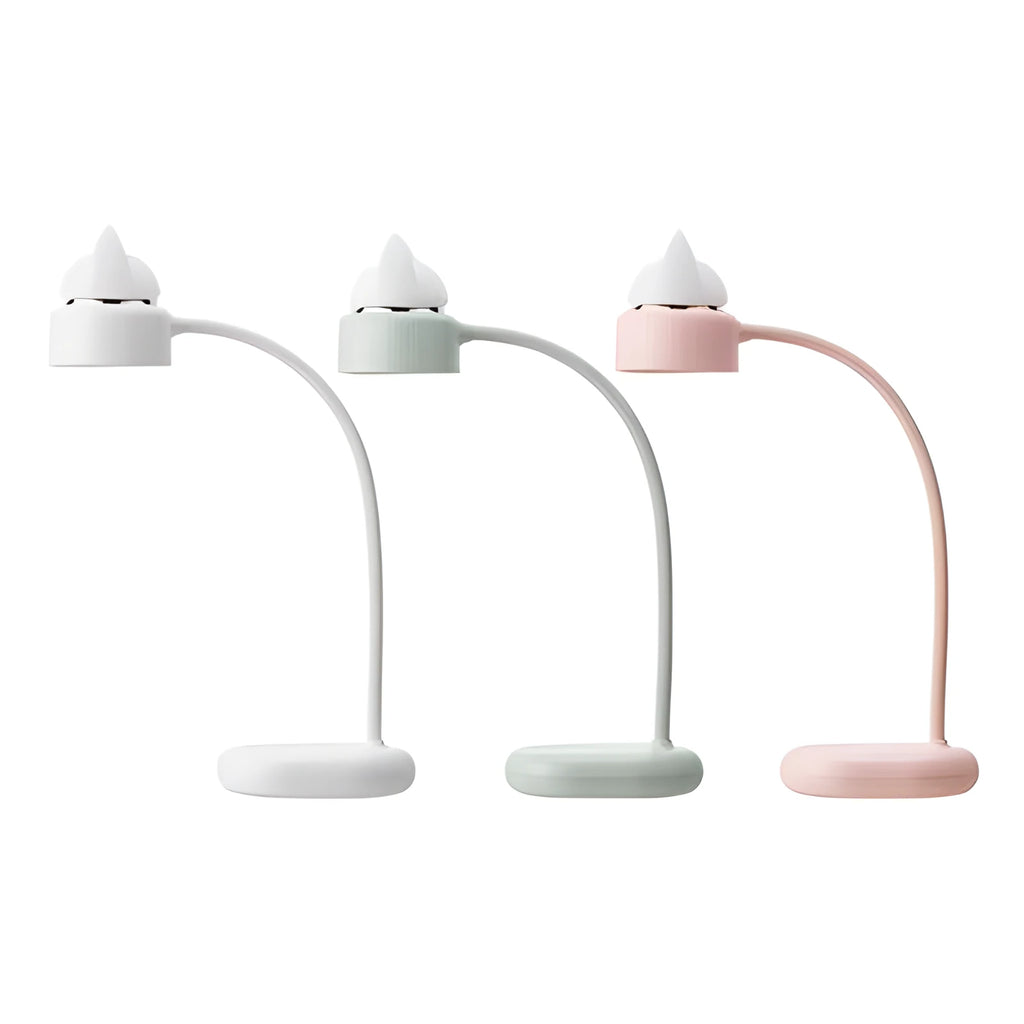 White clip-on LED desk lamp with built-in lithium battery and touch switch on a desk