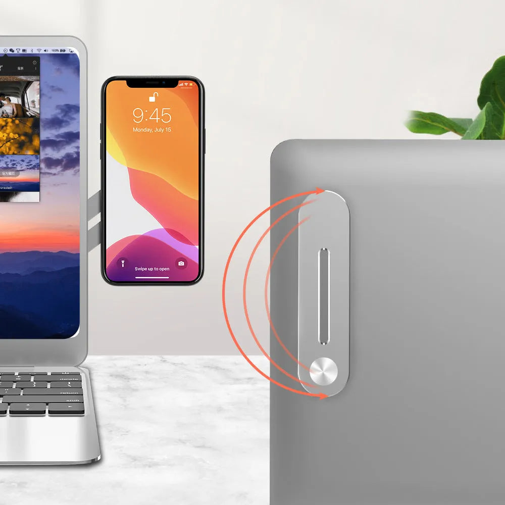 Silver aluminium alloy laptop screen holder with a smartphone attached via magnetic pads