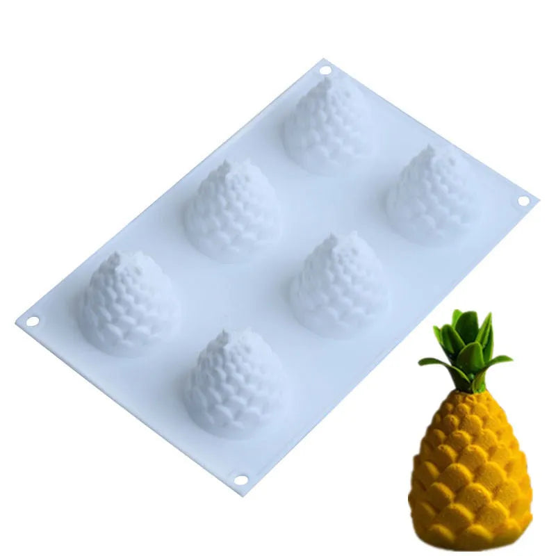 Set of six fruit silicone moulds for baking Italian mousse desserts with pineapple pine cone shapes