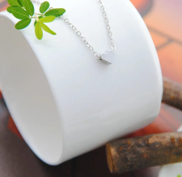 Heart & Soul choker necklace with heart-shaped alloy pendant, plating finish, gold colour, 35cm chain
