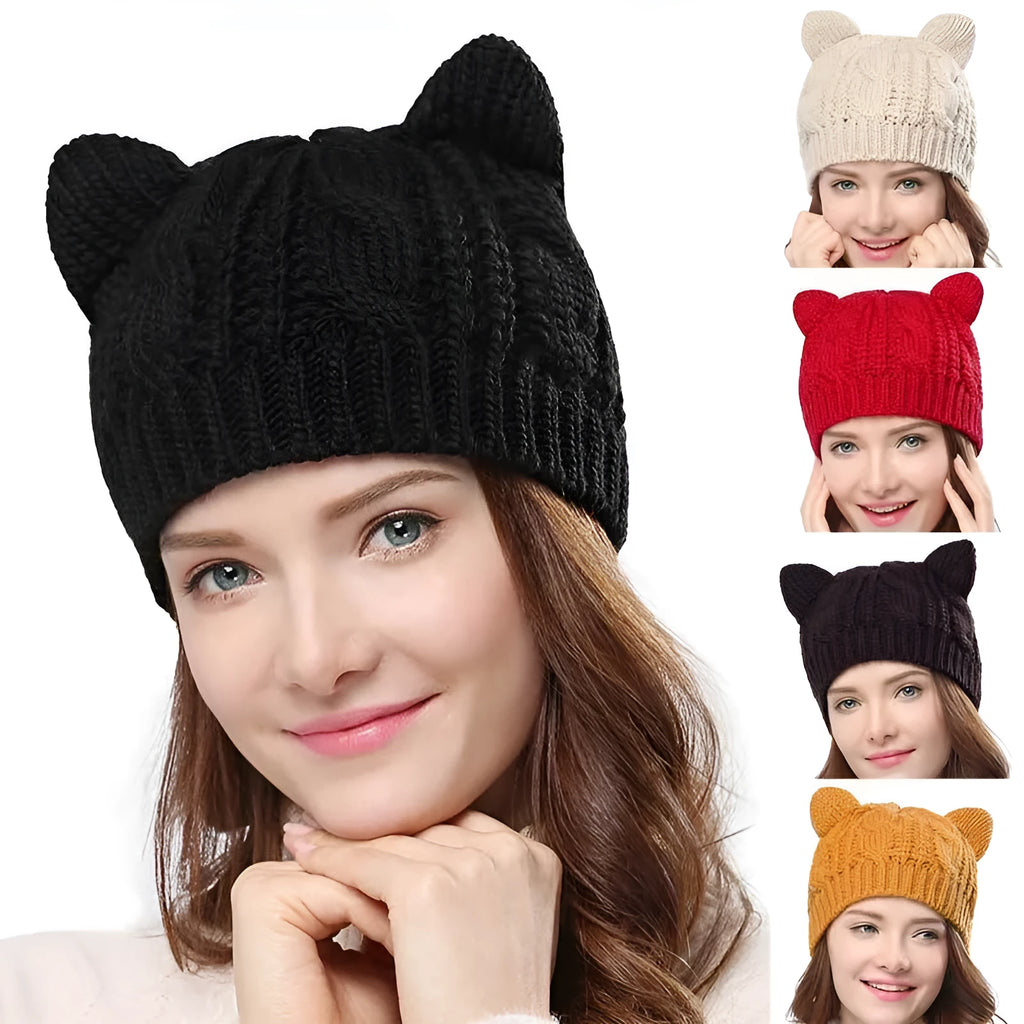 Red handmade knitted wool beanie hat with 3D cat ears on a white background