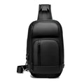 Black PVC outdoor shoulder bag showing computer pocket, air cushion strap, and square vertical design