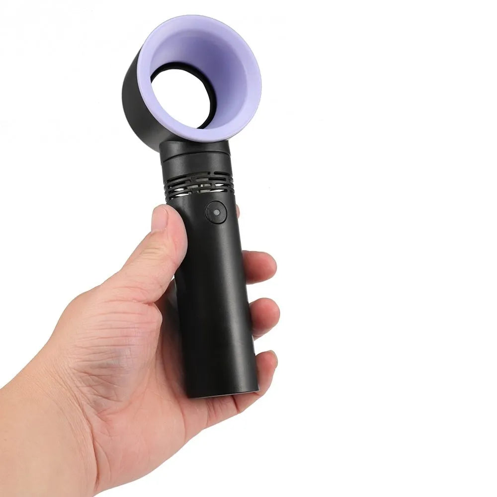 Portable bladeless fan in white with USB charging cable, base, and three speed settings