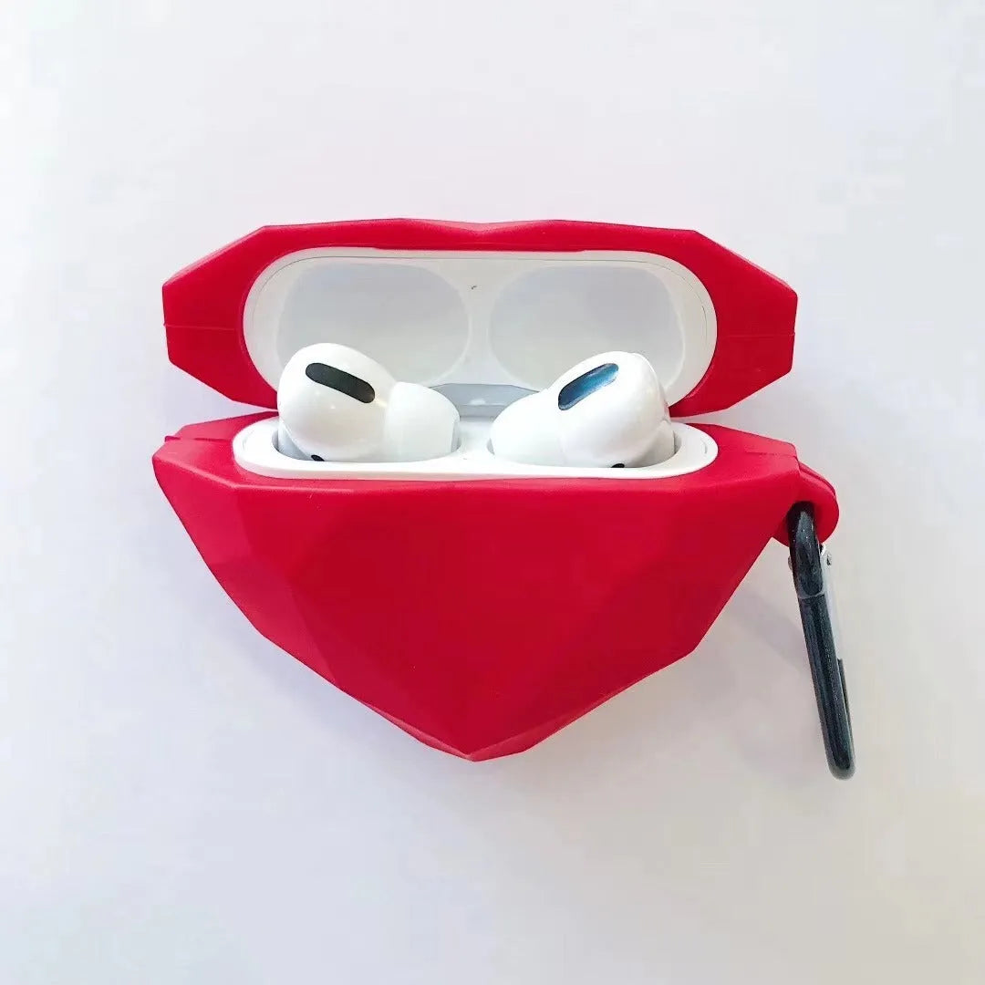 Red diamond love silicone case on Apple AirPods charging case with carabiner clip attached