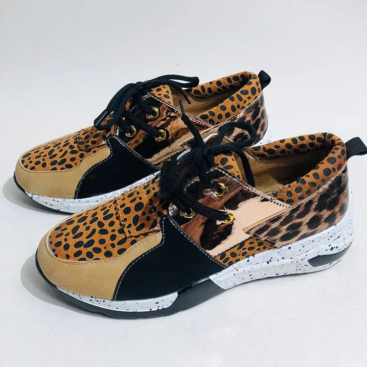 Women's suede casual sneakers with a wedge heel in leopard print colour.