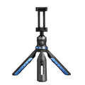Black desktop phone tripod stand compatible with iPhone models on a desk
