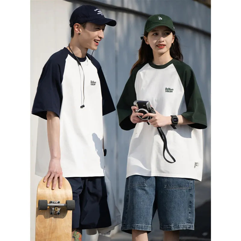 Blue loose-fit men's T-shirt with raglan sleeves in a Japanese Junior casual style.