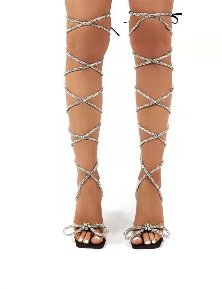 Women's plus size black strappy sandals with rhinestone decoration and a square toe