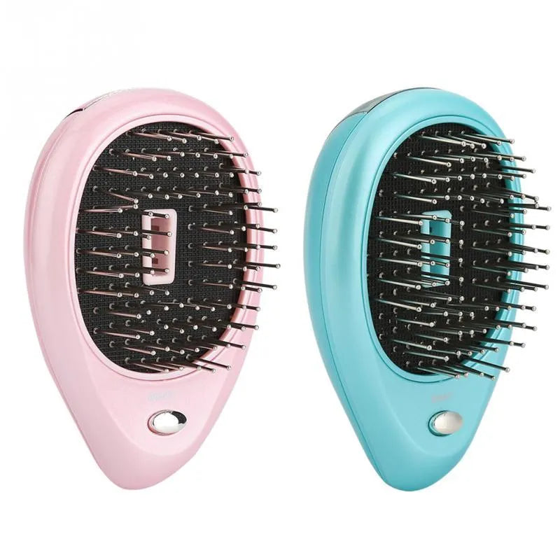Pink electric sound wave vibration magnetic massage comb with ergonomic handle and negative ion function