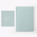 Soft surface dotted A5 notebook with blue imitation leather cover and locking plastic binding