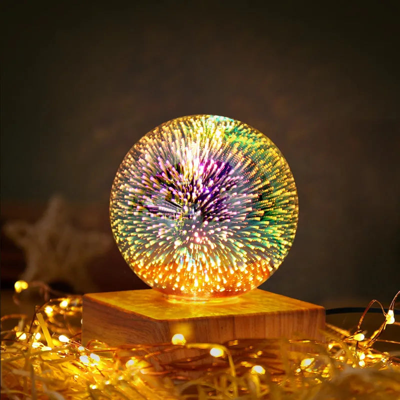 USB 3D firework crystal ball night light with warm LED, touch control, and starry sky effect on a wooden desk