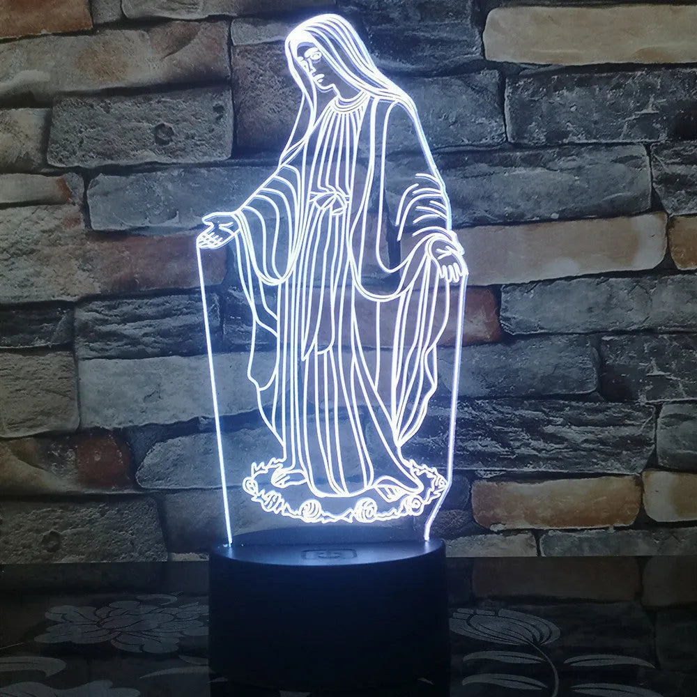 3D LED night light showing colourful dual ring pattern, with remote control and USB cable.
