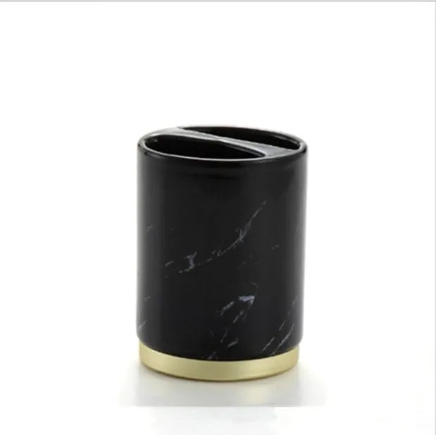 Ceramic bathroom set with emulsion bottle, cup, toothbrush holder, and soap dish in Phnom Penh Ink and Black bright glaze finish