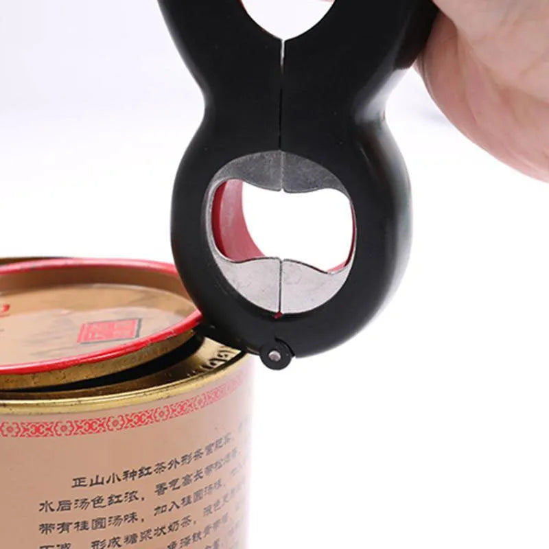 6-in-1 multifunctional can opener and bottle opener in grey on a kitchen worktop showing dual ring design