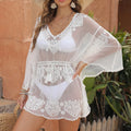 White textured beach blouse with water-soluble pattern designed for sun protection and swimming