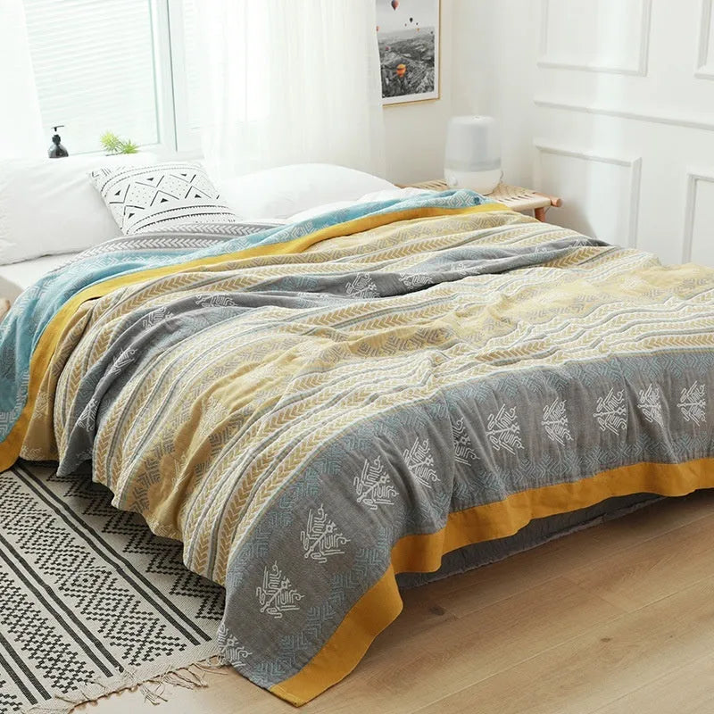 Thickened five-layer pure cotton gauze bed blanket in a modern simple style, shown in blue.