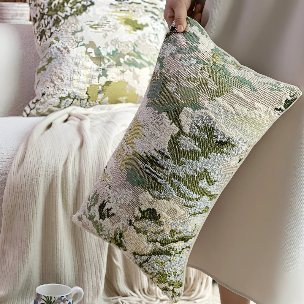 Antique green wool blended cushion with abstract spring flowers pattern, shown in square and waist pillow sizes.