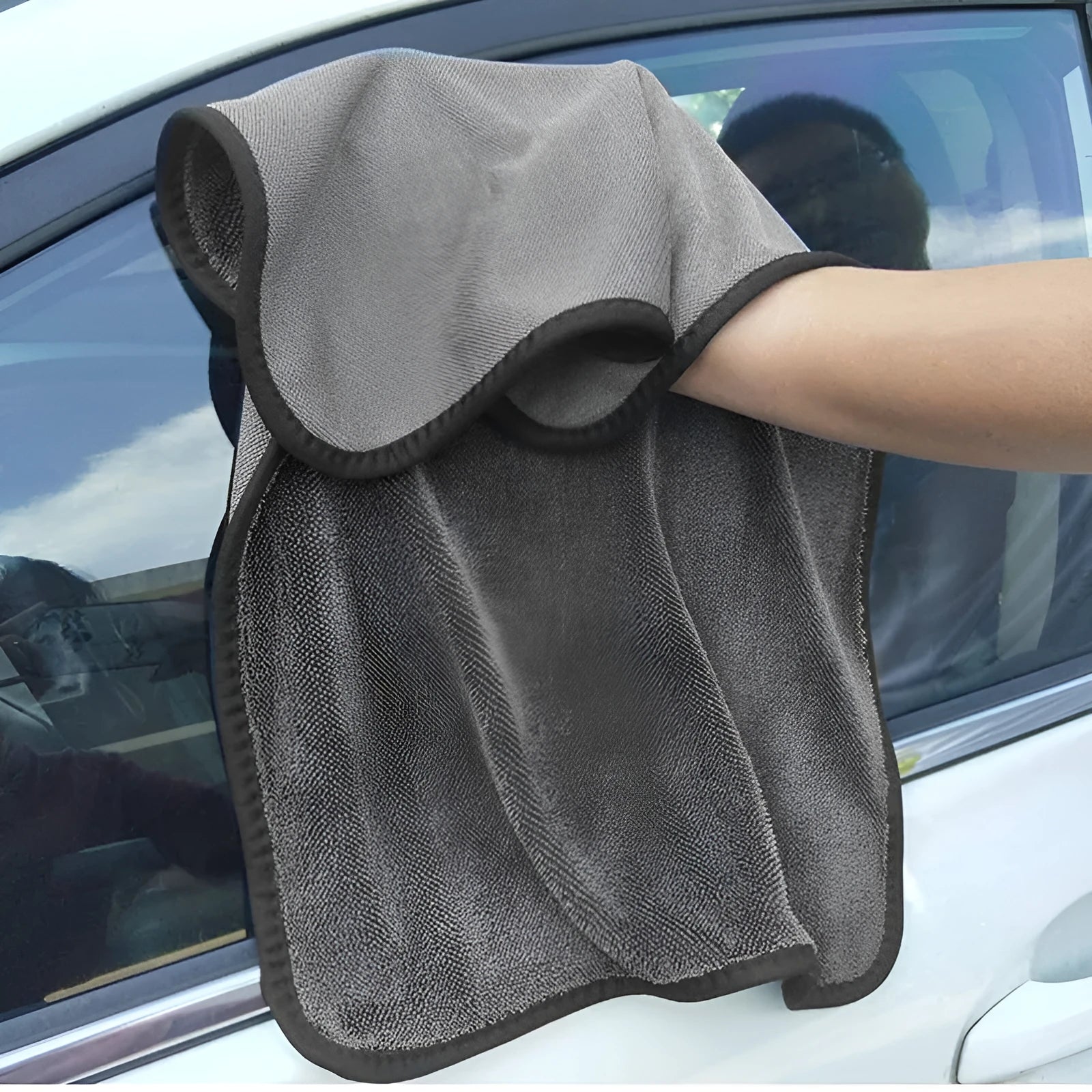 Grey 40x40cm square microfiber car wash and drying towel laid flat