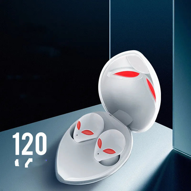Creative Outer T8 Starman black and white alien design wireless earbuds with LED lights next to charging case.