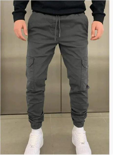 Men's loose casual trousers with dimensional patch pockets and elastic waist in multiple colour options