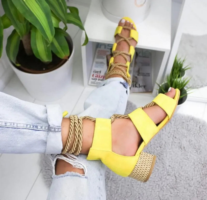 Women's beige suede sandals with thick heel, front strap, ankle strap, and fish mouth toe.