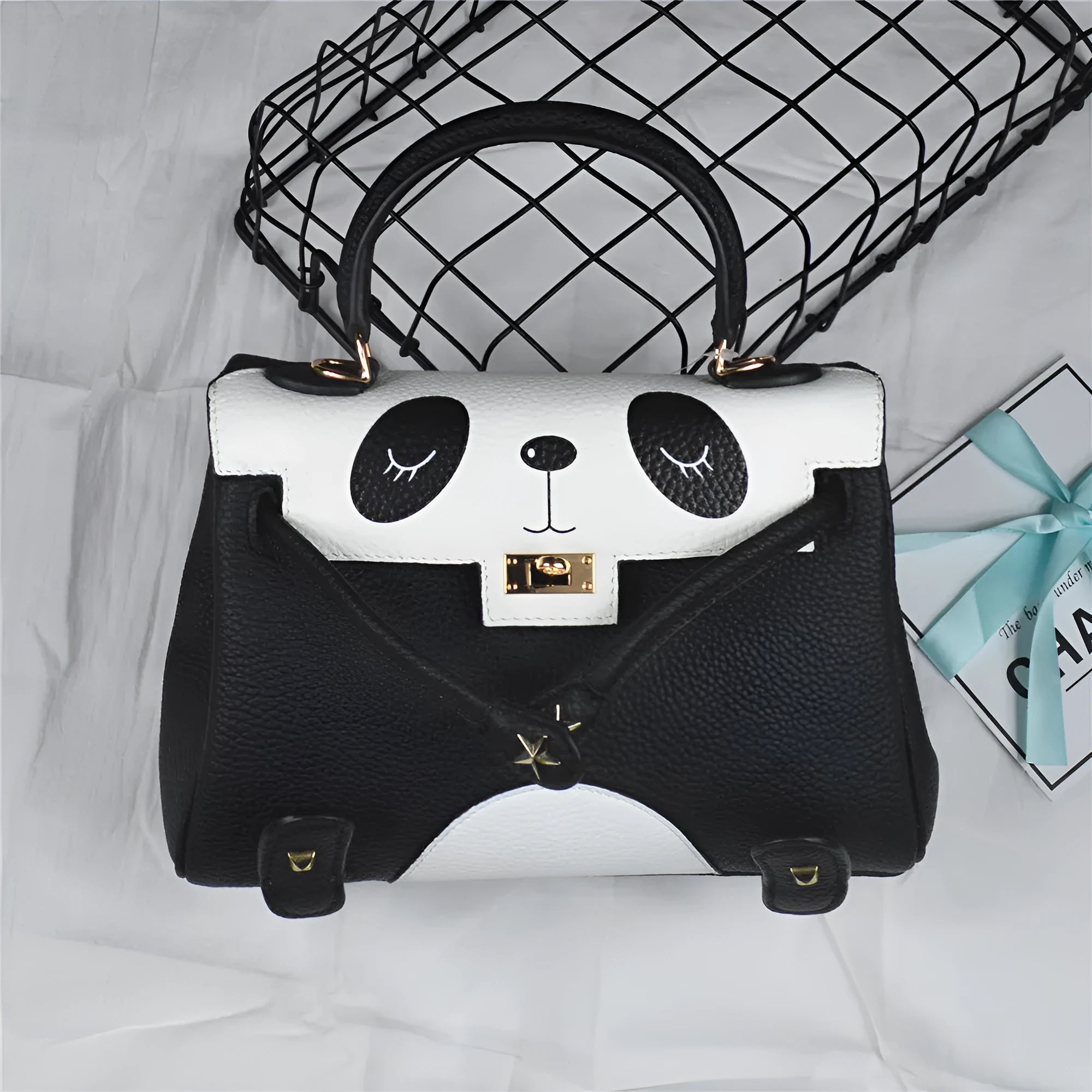 Panda print cowhide leather handbag in horizontal square shape, sweet lady style, shown in two size options.