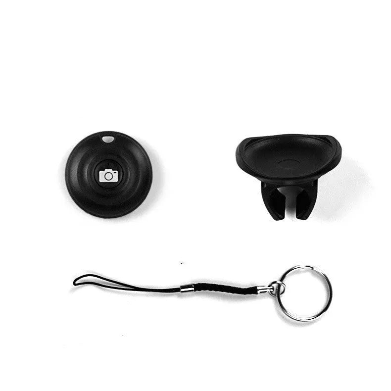 Black Bluetooth selfie remote control with snap attachment for smartphone photography