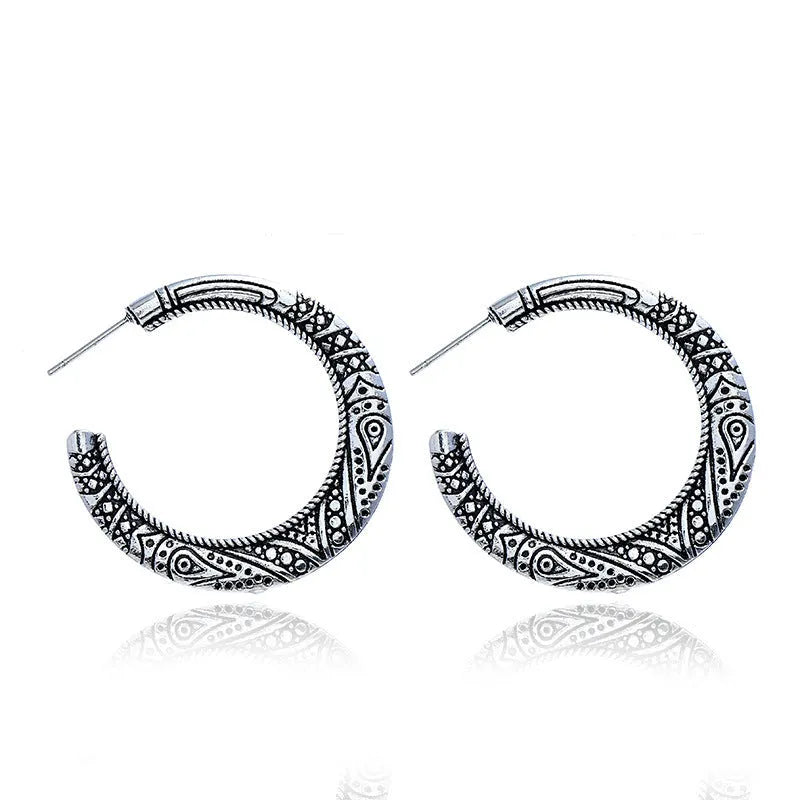 C-shaped vintage engraving earrings with scrollwork design in bronze finish