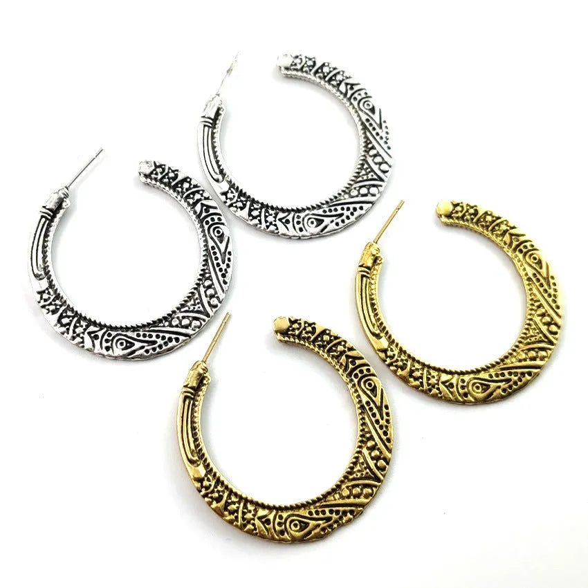 C-shaped vintage engraving earrings with scrollwork design in bronze finish