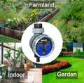 Automatic watering device timer attached to outdoor garden faucet with manual override button