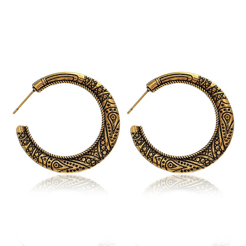 C-shaped vintage engraving earrings with scrollwork design in bronze finish