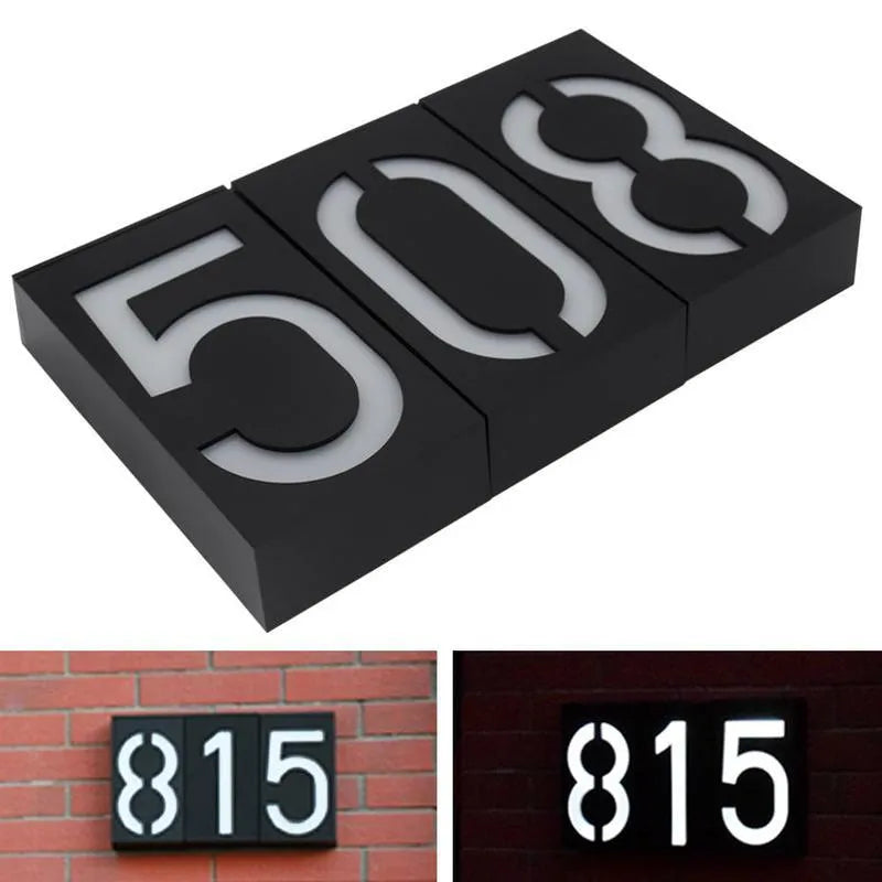 Solar powered LED house number light with IP65 waterproof rating mounted on wall