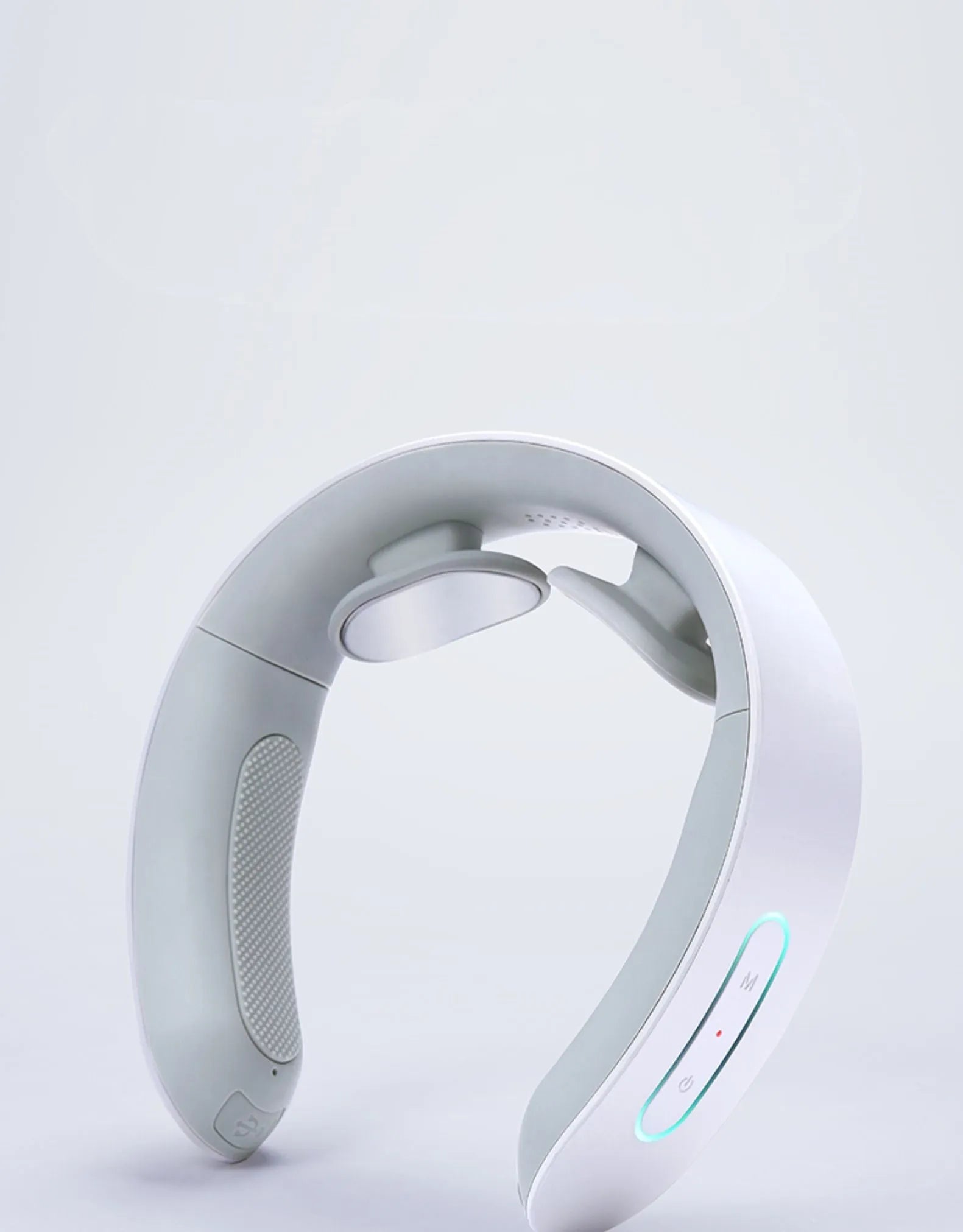 White electric acupressure massager device for back neck and shoulder pain relief with heat therapy.