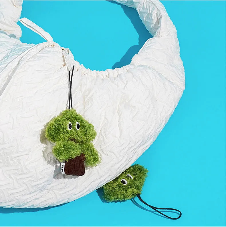 Pine tree shaped fabric cat toy with mint stick inside, measuring 10cm long