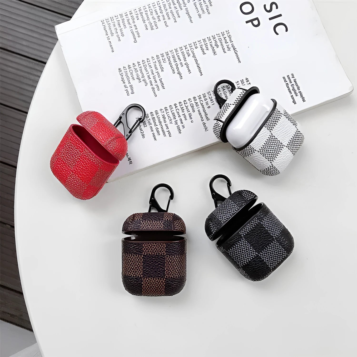Leather look hard shell phone case for iPhone XS MAX with a hook for AirPods 2 case, shown in a grid pattern.